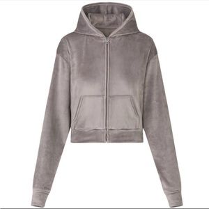 SKIMS cropped velour hoodie in color gray